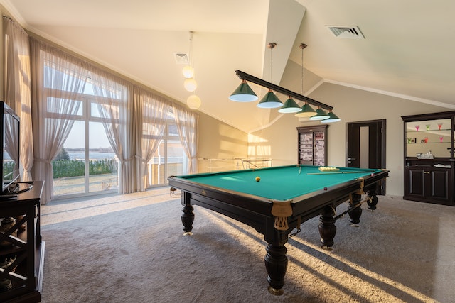 Billiards table in a large room with carpet flooring.